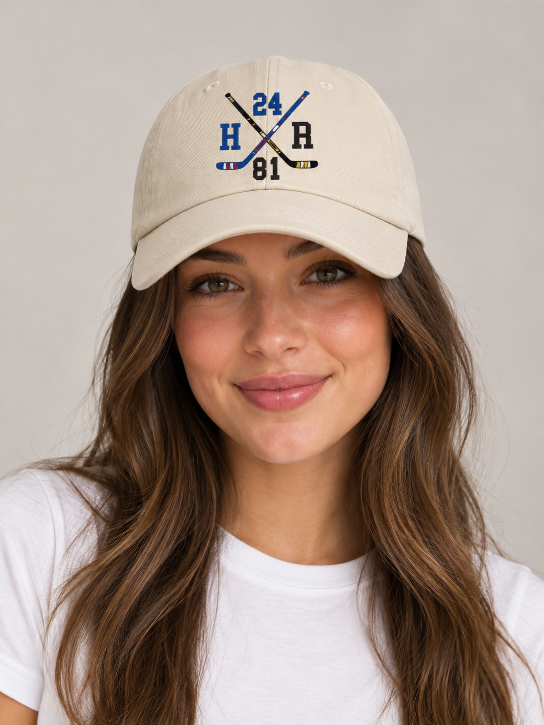 Model wearing the 24 x 81 Hockey Sticks Hat, rivals-to-lovers hockey romance merch by Girl Tribe Co.