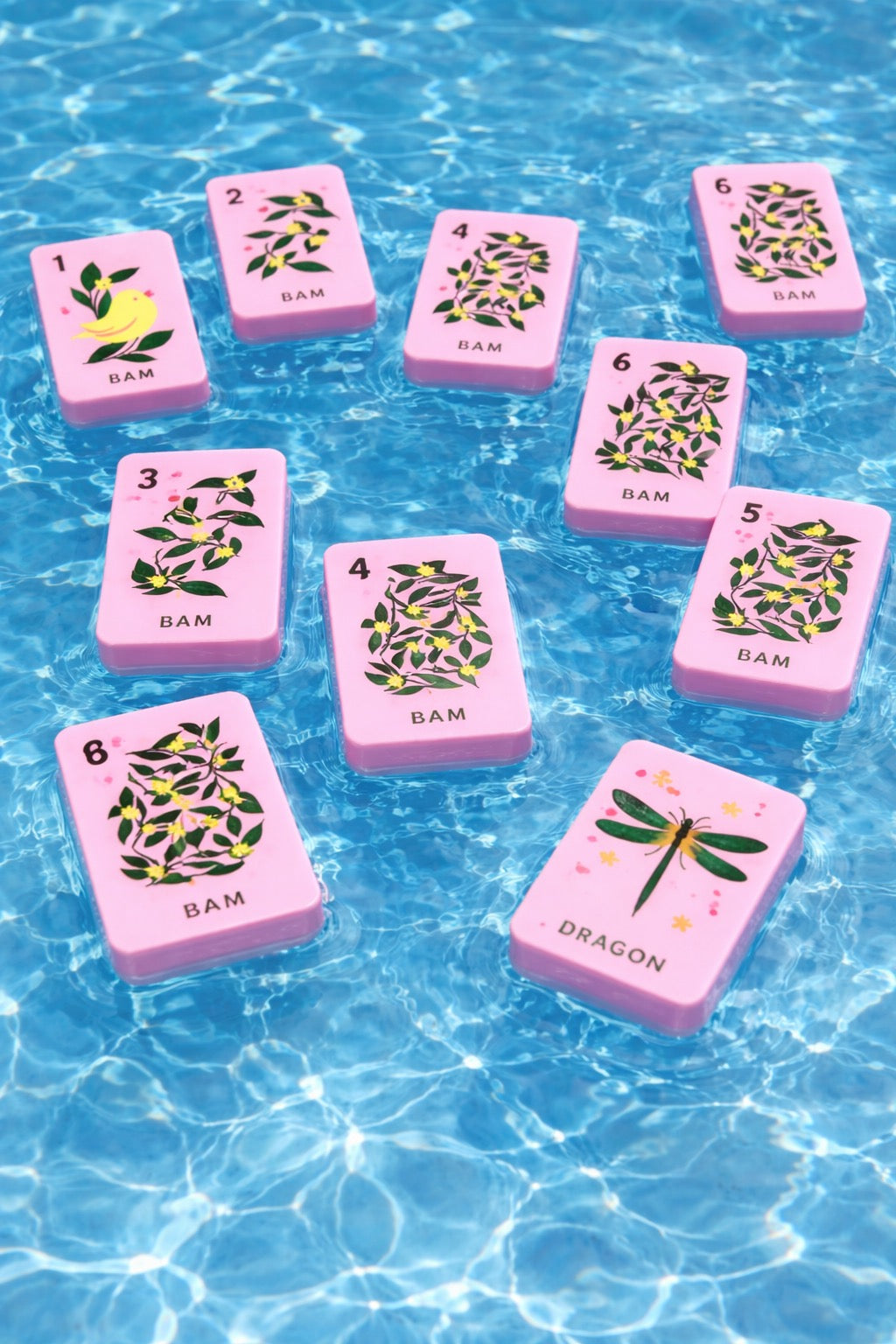 Floating Mahjong Tiles in Floral Pink for the Pool