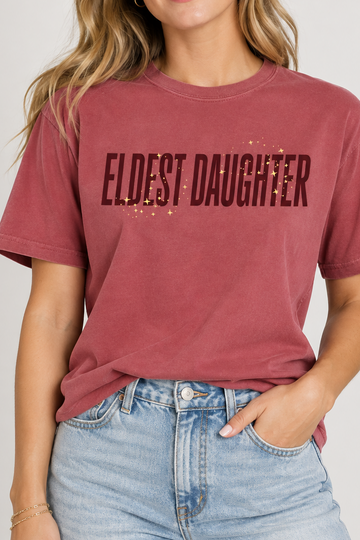 Model wearing the Eldest Daughter Tee in Crimson