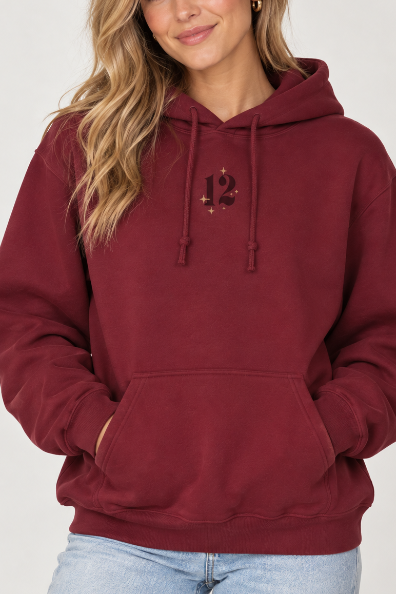 Model wearing the Showgirl Era Hoodie in Maroon - front