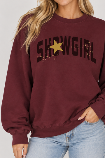 Model wearing the Showgirl Star Sweatshirt in Maroon
