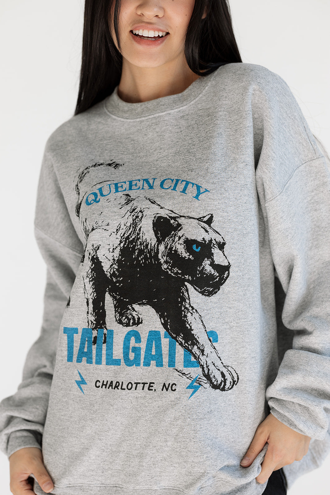 Heather gray Queen City tailgate sweatshirt with bold panther graphic, cozy fabric perfect for game day or fall layering
