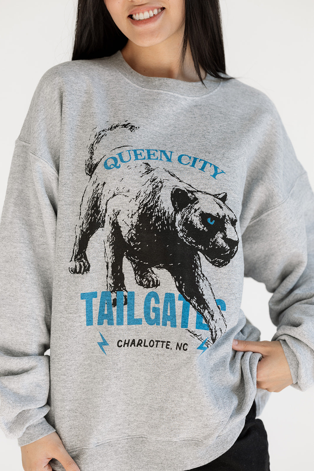 Heather gray Queen City tailgate sweatshirt with bold panther graphic, cozy fabric perfect for game day or fall layering