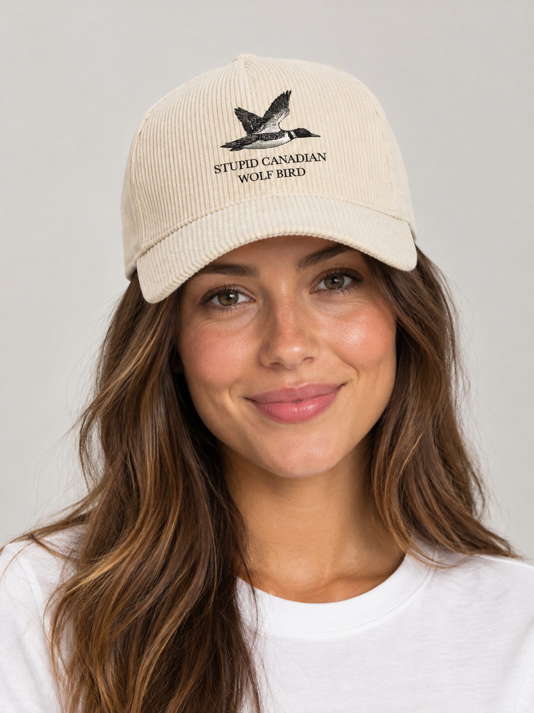 Model wearing the Canadian Wolf Bird Hat, rivals-to-lovers hockey romance merch by Girl Tribe Co.