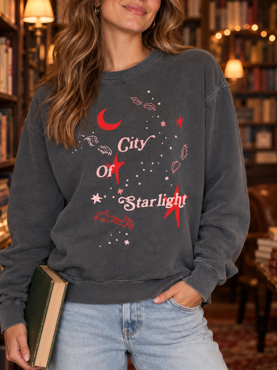 Model wearing the City of Starlight Sweatshirt, fae-court romantasy book merch by Girl Tribe Co.