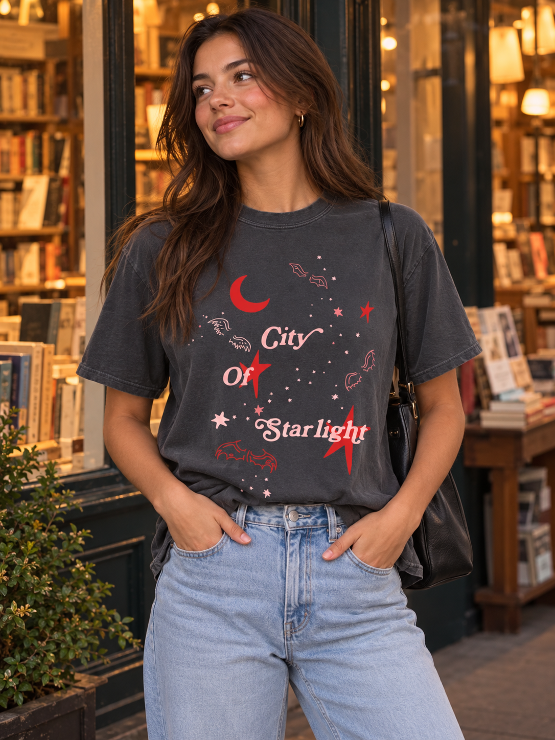 Model wearing the City of Starlight Tee, fae-court romantasy book merch by Girl Tribe Co.