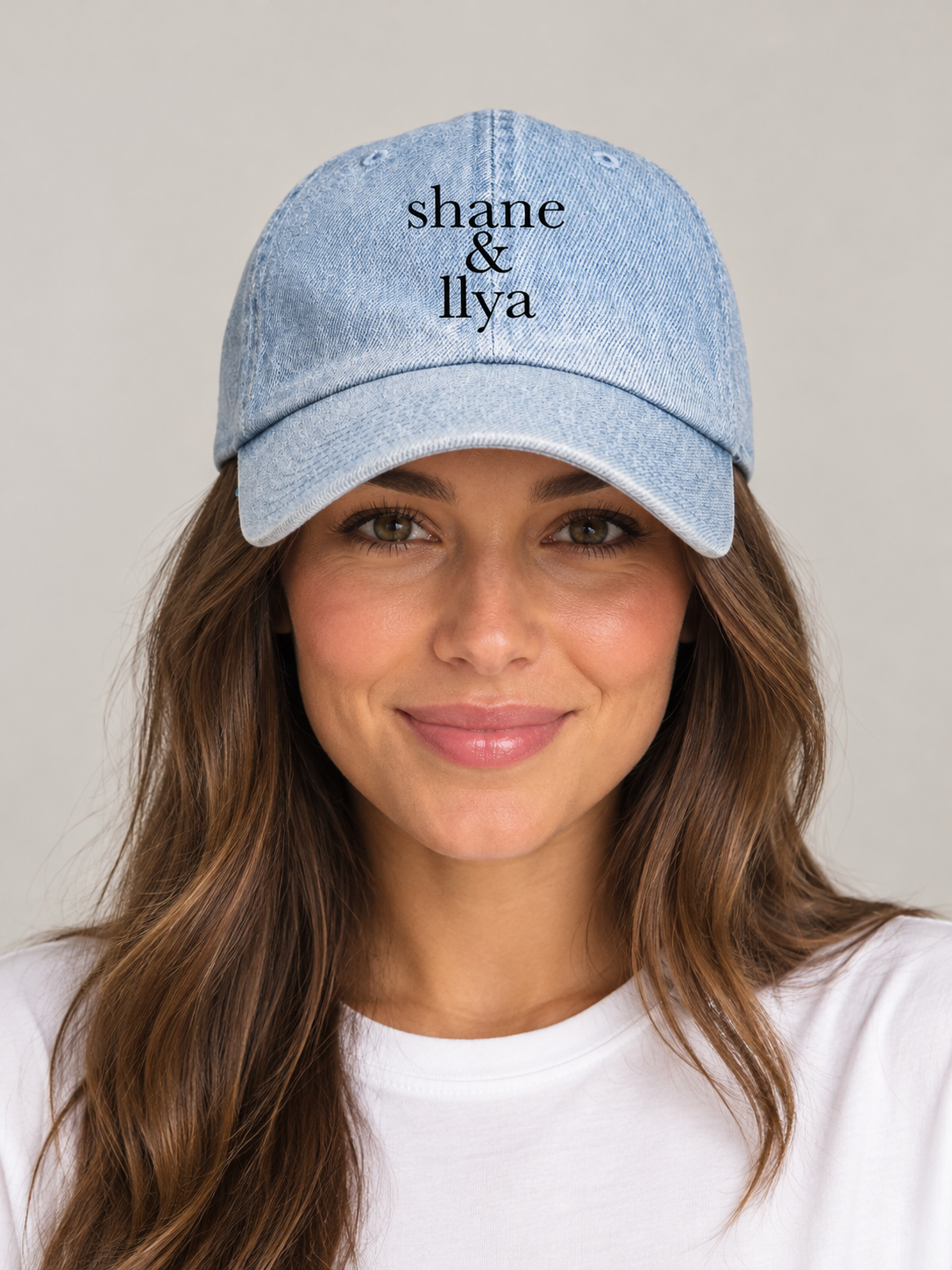 Model wearing the Shane & Ilya denim hat, rivals-to-lovers hockey romance merch by Girl Tribe Co.