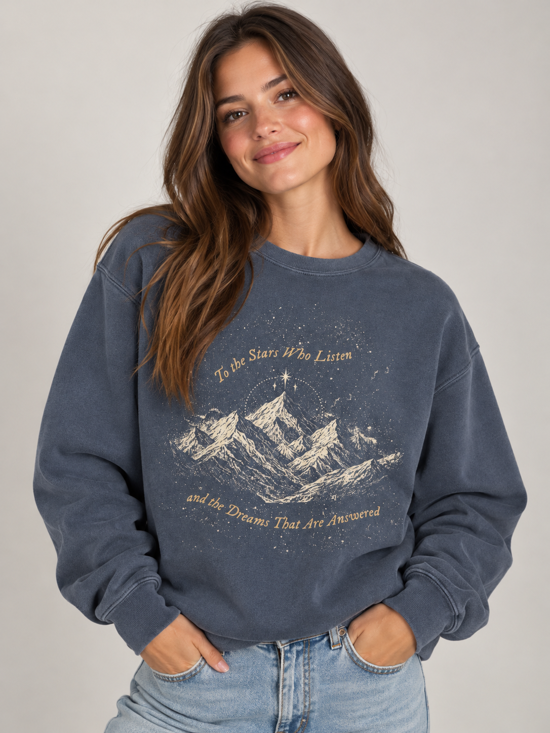 Model wearing the To the Stars Who Listen sweatshirt, fae-court romantasy book merch by Girl Tribe Co.